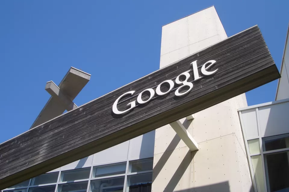 Photo of google sign outside of google cafeteria